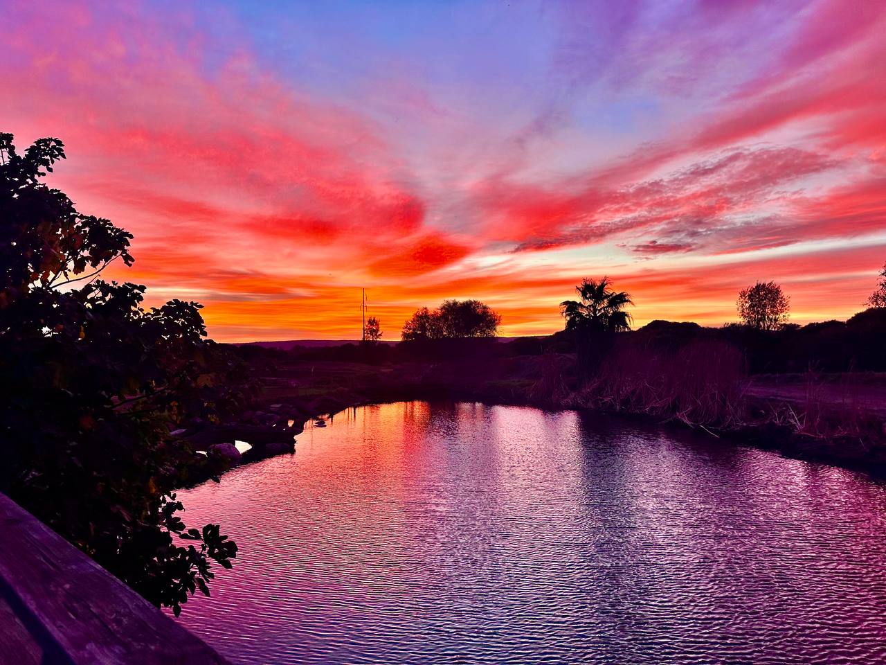 Sunset over the dam at Munrowd Ranch